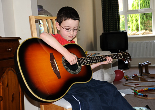 Jon playing the guitar